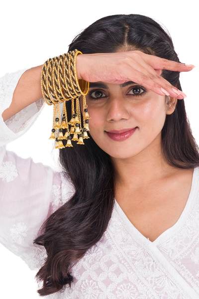 Gold & Black Color Gold Plated Metal Latkan Bangles Set together in one hand