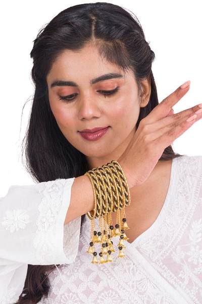 Gold & Black Color Gold Plated Metal Latkan Bangles Set together in one hand 02