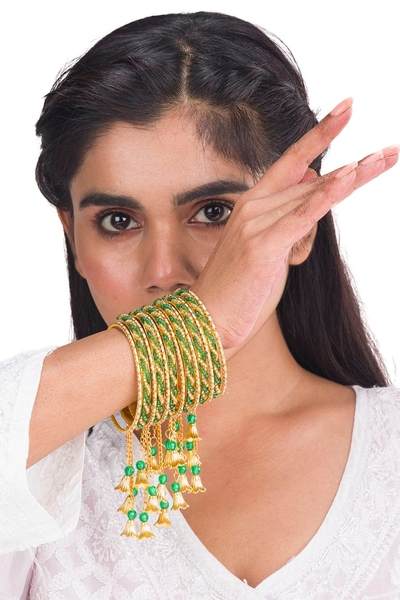 Gold and Green Color Gold Plated Metal Latkan Bangles Set together in one hand 02