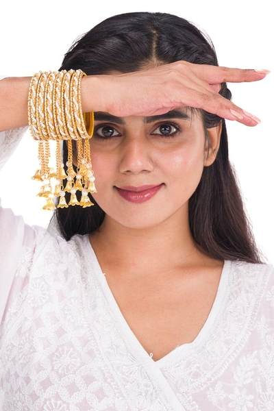 White Color Gold Plated Metal Latkan Bangles Set together in one hand