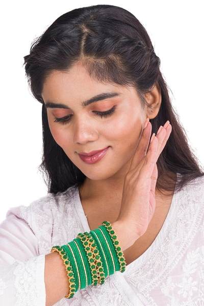 Golden and Green Velvet Bangles Set Pack of 26 together in one hand 