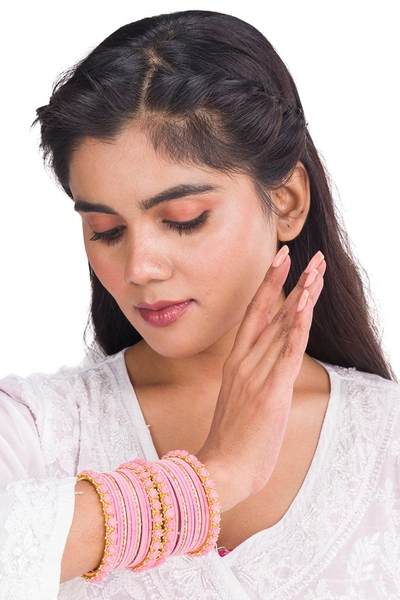 Golden and Pink Velvet Bangles Set Pack of 26 together in one hand 