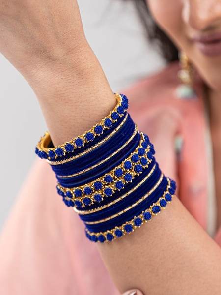 Golden and Blue Velvet Bangles Set Pack of 26 together in one hand