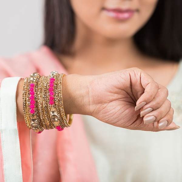 Metal with Zircon Gemstones Glossy Finished Gold & Rani Color Bangles Set together in one hands