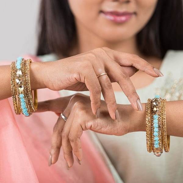 Metal with Zircon Gemstones Glossy Finished Gold & Surf Color Bangles Set together in two hands